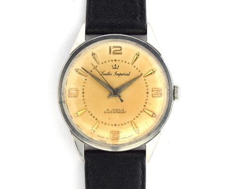 A SMITHS IMPERIAL WATCHCirca 1950s, cream face with Arabic numerals on quartersMovement: manual, cal. 0104Case: diameter 35mm