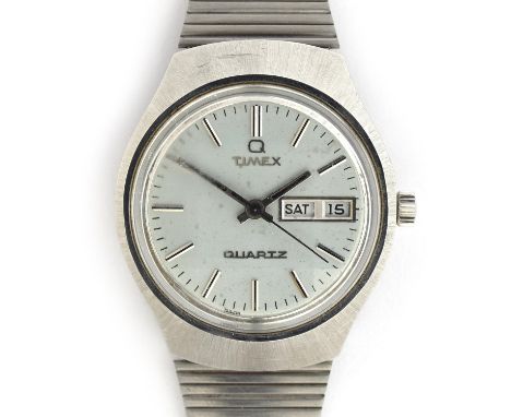 A TIMEX ELECTROMECHANICAL DAY DATE WRIST WATCHWith unusual faceted glass 