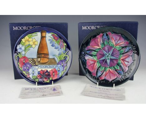 A Moorcroft limited edition Centennial plate 1897-1997, designed by Rachel Bishop, No. 665 of 750, signed in gilt, impressed 