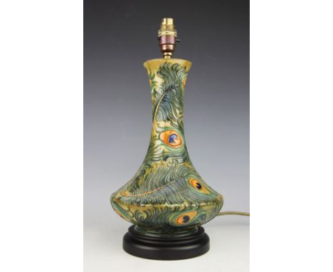 A Moorcroft Phoenix pattern lamp base, c.1996, designed by Rachel Bishop with a peacock feather design, 38.5cm high (inc. fit