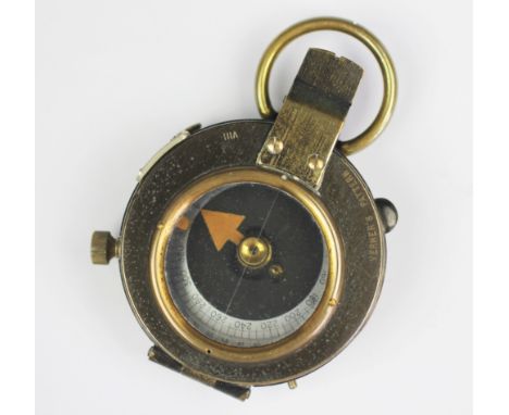 A World War I lacquered brass military field compass, by S Mordan & Co, numbered 62874 and dated 1917, in leather case stampe