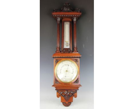 A Victorian carved oak barometer, 103cm (at fault)