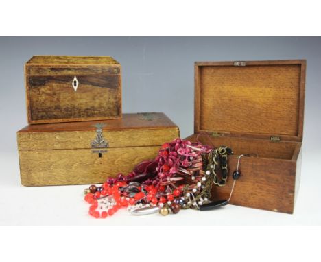 A 19th century inlaid rosewood tea caddy, 13cm H x 19cm W, with an oak box containing costume jewellery, an oak writing slope