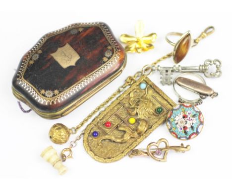 A Victorian tortoiseshell and pique work purse, inset with a shield initialled 'JS', 7cm wide, a miniature bone stanhope case