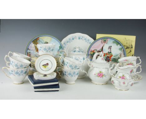 A Colclough tea service, pattern No. 8454, comprising eight teacups and saucers, eight plates, a teapot and cover and a servi