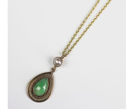 A jade and mabe pearl set pendant and attached chain, the pear shaped pendant suspended from a pearl drop, unmarked, attached