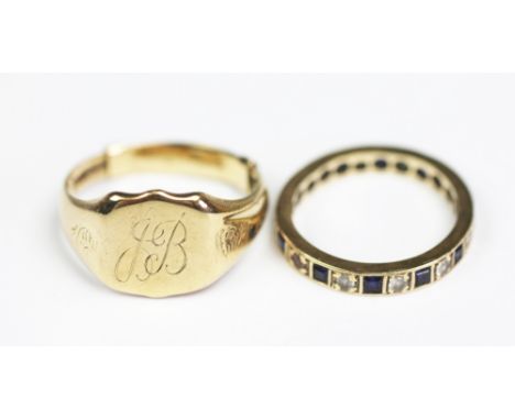 A 9ct yellow gold signet ring, weight 5.5gms and a colourless and blue stone set full eternity ring, also in 9ct gold, weight