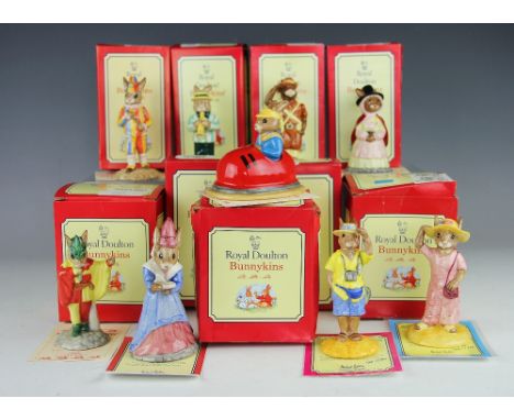 Nine Royal Doulton Bunnykins comprising; Tourist DB 190, Sightseer DB 215, Trumpet Player DB 210 No.1056/2500, Mr Punch DB 23