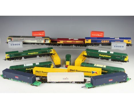 A collection of nine Freightliner OO gauge trains, to include Heljan, Bachmann, Hornby and Lima examples, with six EWS locomo