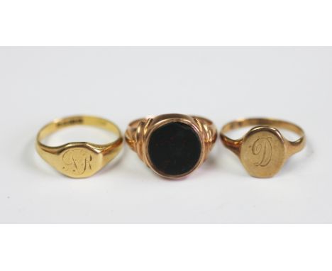 A bloodstone set gold signet ring and a 9ct gold signet ring, gross weight 7gms along with an 18ct yellow gold signet ring, 3