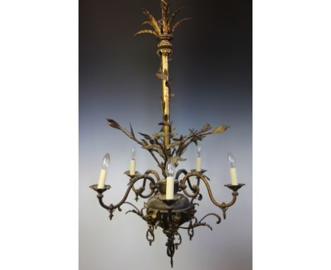 A 19th century gilt brass five light chandelier / ceiling light, modelled with mistletoe, acanthus scroll arms and rams heads