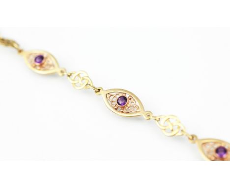 A Clogau gold amethyst set bracelet, designed as four navette shaped panels, each set with a cabochon turquoise stone and joi