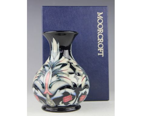 A Moorcroft Snakeshead vase, 1996, of waisted form with everted rim, painted 'WM' to underside, 16cm high, in original box