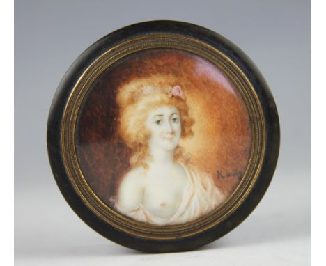 An early 19th century tortoiseshell circular snuff box and cover, the cover inset with an erotic female quarter length portra