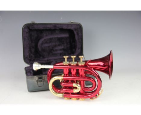 A Roy Benson lacquered brass cornet, in case with mouth piece