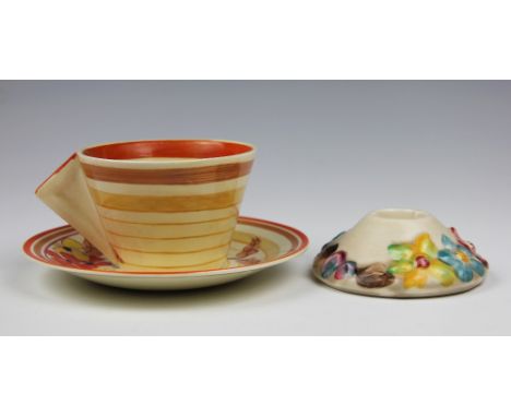 A Clarice Cliff Bizarre Orange Hydrangea pattern conical cup and saucer, circa 1934, cup 6.5cm high (restored to base), sauce