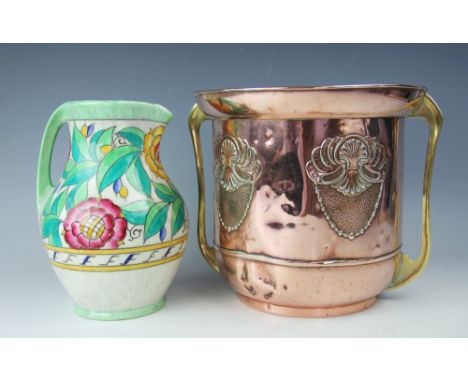 An Art Nouveau Beldray copper and brass jardiniere, decorated in relief with shells motifs, with two brass handles, stamped t