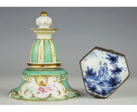 A late 18th century blue and white enamel snuff box, (at fault) and a 19th century porcelain powder tower, formed with a cove