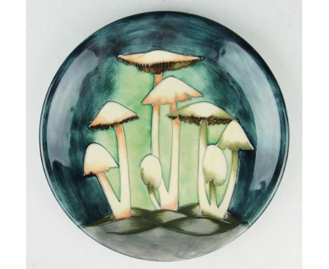 A Moorcroft Fairy Ring plate, 1990, painted 'WM' to underside, with painted and impressed marks to underside, 25.5cm diameter
