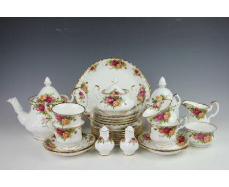 A Royal Albert Old Country Roses part tea service, comprising; a teapot and cover, sugar bowl and cover, sugar bowl, milk jug