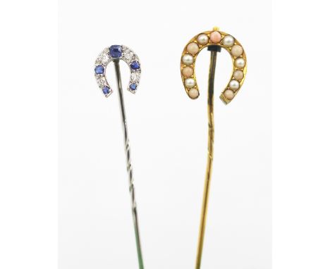 Two horseshoe set stick pins, to include; a sapphire and diamond set example set in white metal and a coral and seed pearl se