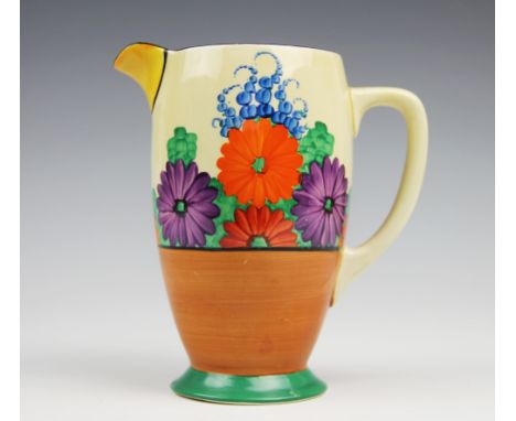 A Newport Pottery Clarice Cliff Bizarre, Gay Day pattern jug, decorated with the brightly coloured flowers within orange and 