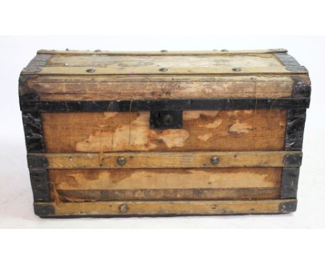 A late Victorian ash bound domed top trunk, enclosing a silver plate wine cooler, two clocks, Start camera and other items (a