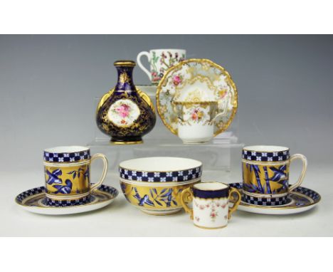 A selection of Coalport comprising; a pair of Japanese Grove pattern coffee cups and saucers and a sugar bowl, an Indian Tree