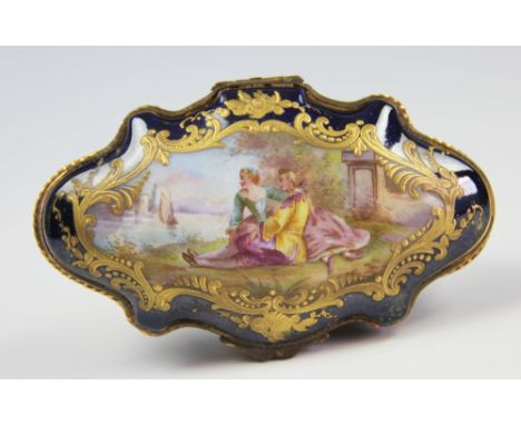 A 19th century Sevres porcelain and ormolu trinket box, of serpentine form, the cover depicting lovers beside a river, all wi