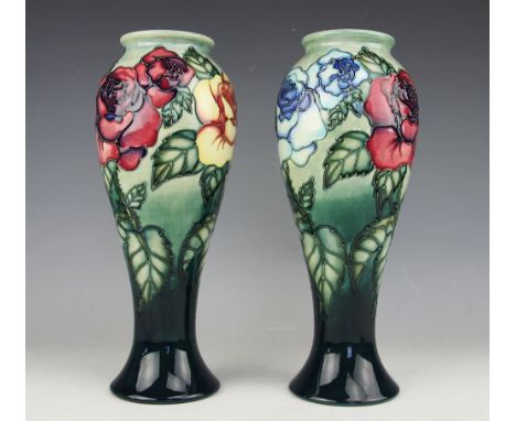 A pair of Moorcroft limited edition Rose pattern vases, 1994, each baluster vase decorated in yellow and blue roses, No. 481 