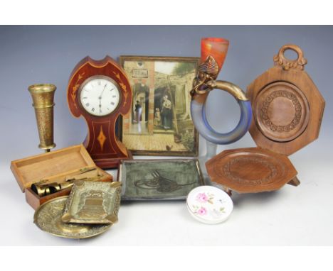 An Edwardian inlaid mahogany eight day mantel time piece, with Roman numeral dial and Art Nouveau shaped case, 26cm H, with a