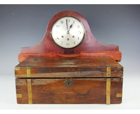 A Victorian brass bound walnut writing slope, 45cm long, with a mahogany eight day mantel clock, with movement striking on fo