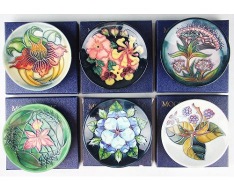A collection of six Moorcroft pin dishes comprising; Bramble 1995, Gypsy 1997 centenary edition, painted 'WM' to underside, O