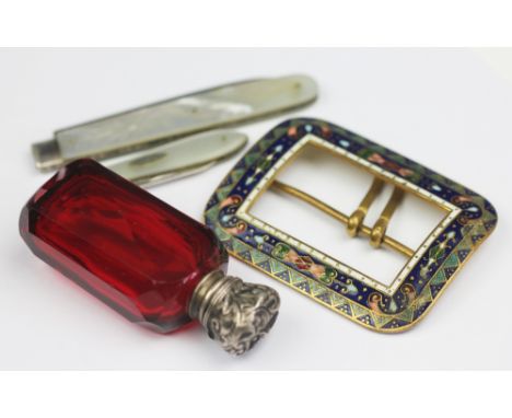 A Victorian ruby glass and white metal mounted scent bottle, the faceted body terminating in a hinged top cap, 7cm high, alon