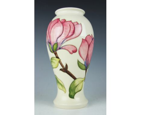 A large Moorcroft Magnolia pattern vase, decorated with pink flowers against an ivory ground, impressed marks and painted ini