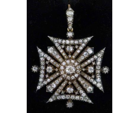 Pattee form Maltese cross set with pave diamonds, circa 1840, in silver on gold with a detachable brooch pin and pendant susp