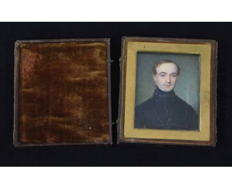 English School, early 19th century,  Portrait of a gentleman, watercolour on ivory, in original leather bound case, 6.5 x 5cm