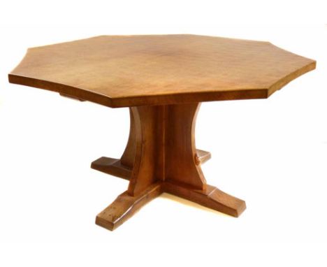 Robert (Mouseman) Thompson oak dining table, octagonal top with adzed decoration standing on single column, constructed of fo