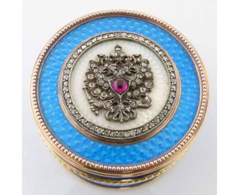 Russian bi-coloured gold, enamel and diamond circular box, decorated in the Faberge style, the cover depicting the imperial d
