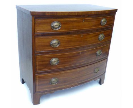 19th century mahogany bow front chest of drawers, top with chequered stringing above four graduated drawers with replacement 