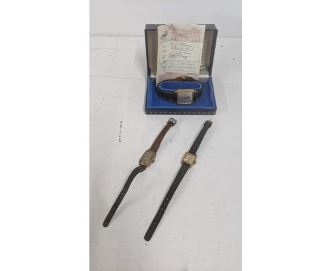 Wristwatches to include a 9ct gold Tissot lady's manual wind wristwatch on a black leather strap, total weight 10.3g, togethe