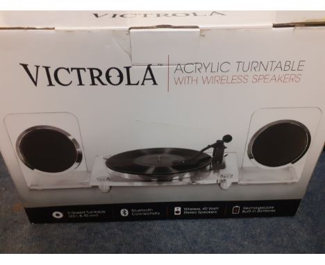 A boxed Victrola acrylic turntable with wireless speakers, model no:VM-100C together with instruction manual. Location:RABIf 