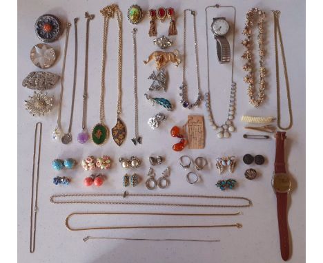 A quantity of vintage costume jewellery and 2 gents watches to include a silver tone brooch with lotus flower and buddha head