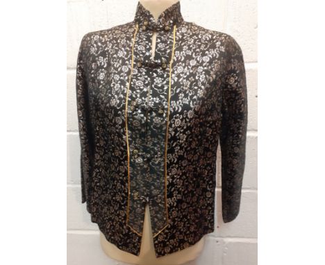 A 1960's Japanese hand made ladies black box jacket with Mandarin collar, fabric knot button front fastening and machine made