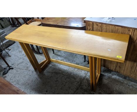 A light oak contemporary fold over table 76 x 160.5 x 40 (when un-extended, 80cm when extended)Location:If there is no condit