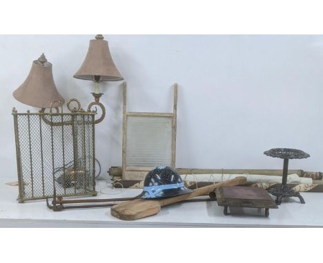 A mixed lot to include a brass fine screen, lamp A/F, a war time helmet with later floral decorationLocation:If there is no c