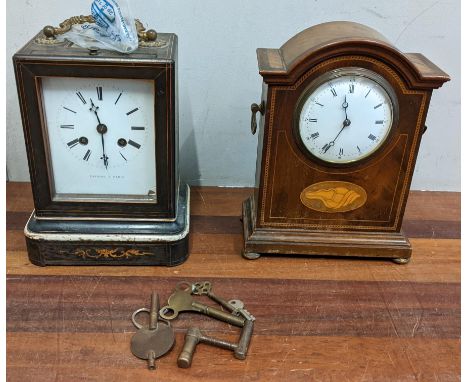 An Edwardian mahogany mantle clock together with a late 19th century French mantle clock signed Savoine A ParisLocationIf the