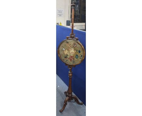 A Victorian walnut and tapestry firescreen, standing on three cabriole carved legs, 156h x 38wLocation:If there is no conditi