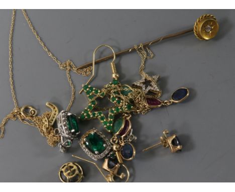 Two small 14ct gold and diamond pendant necklaces, a 14ct gold and emerald star pendant, three pairs of ear studs and a stick