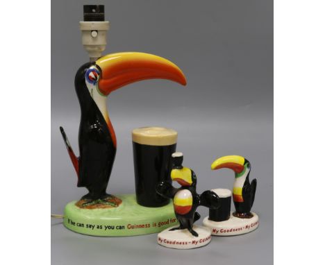 A Carlton ware Guinness advertising toucan lamp base and two similar figures lamp height 29cm